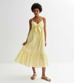 NL yellow schiffli front tie dress